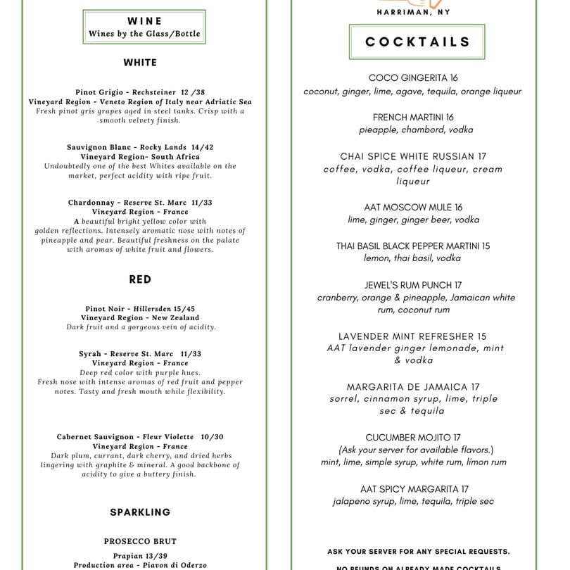 A white menu with green borders, listing various wines by the glass/bottle and cocktails.