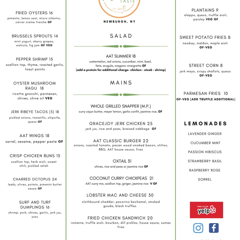 A white menu from An Artistic Taste restaurant, featuring Caribbean-inspired dishes and drinks in black text.